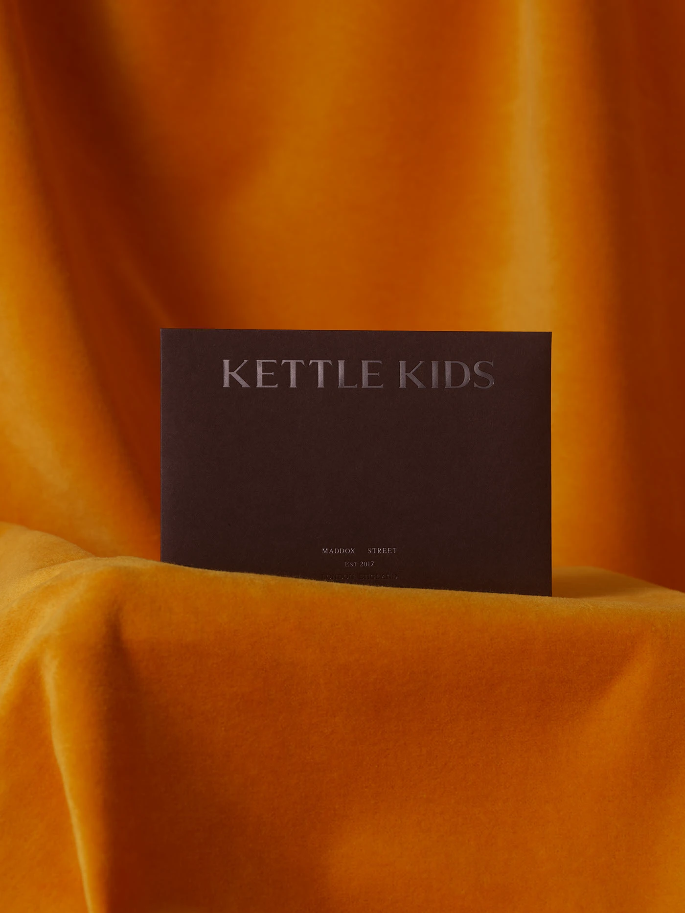 Kettle Kids card on velvet